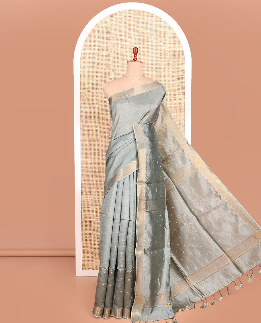 Grey Banana Pith Saree Elevated with Zari Buttas, Temple Border of Zari Designs, Subtle Pallu of Zari Designs, and Paired with a Matching Blouse