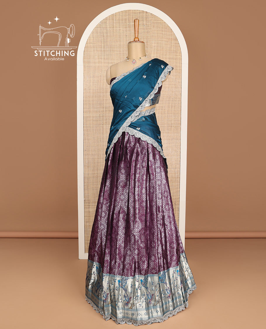 Violet floral jacquard half saree with contrast zari design border , zari design blouse & floral zari design dhavani