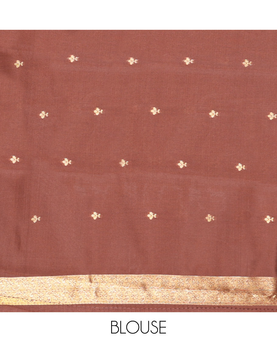 Rust Orange Kanchi Silk Saree, Accentuated with Paisley Zari Buttas All Over Its Body, Complemented by a Contrast Border of Floral and Paisley Designs, Grand Pallu of Jaal Design, and Paired with a Contrast Blouse