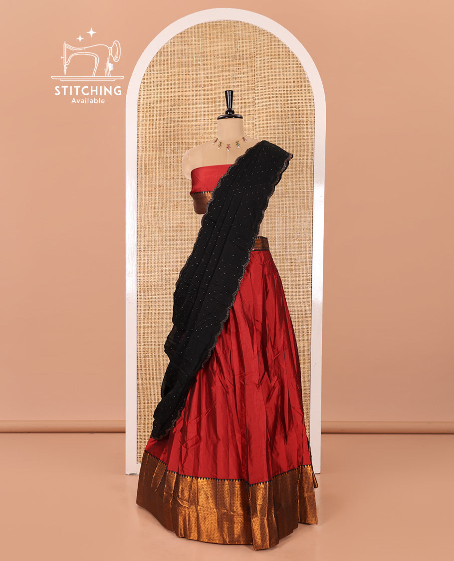 Maroon Taffeta Silk Half-Saree Featuring a Plain Skirt, Complemented by a Contrast Traditional Zari Design Border, Paired with a Matching Blouse, and a Georgette Scallop-Bordered Stone Work Dhavani