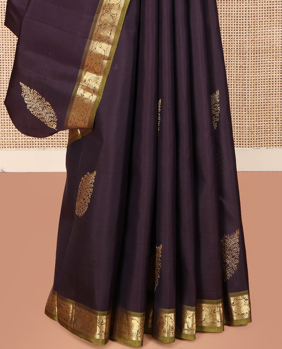 Brown Kanchipuram Silk Saree, Decked Up with Zari Buttas All Over Its Body, Complemented by Contrast Border of Manga and Mayil Designs, Grand Pallu, and Paired with a Contrast Blouse