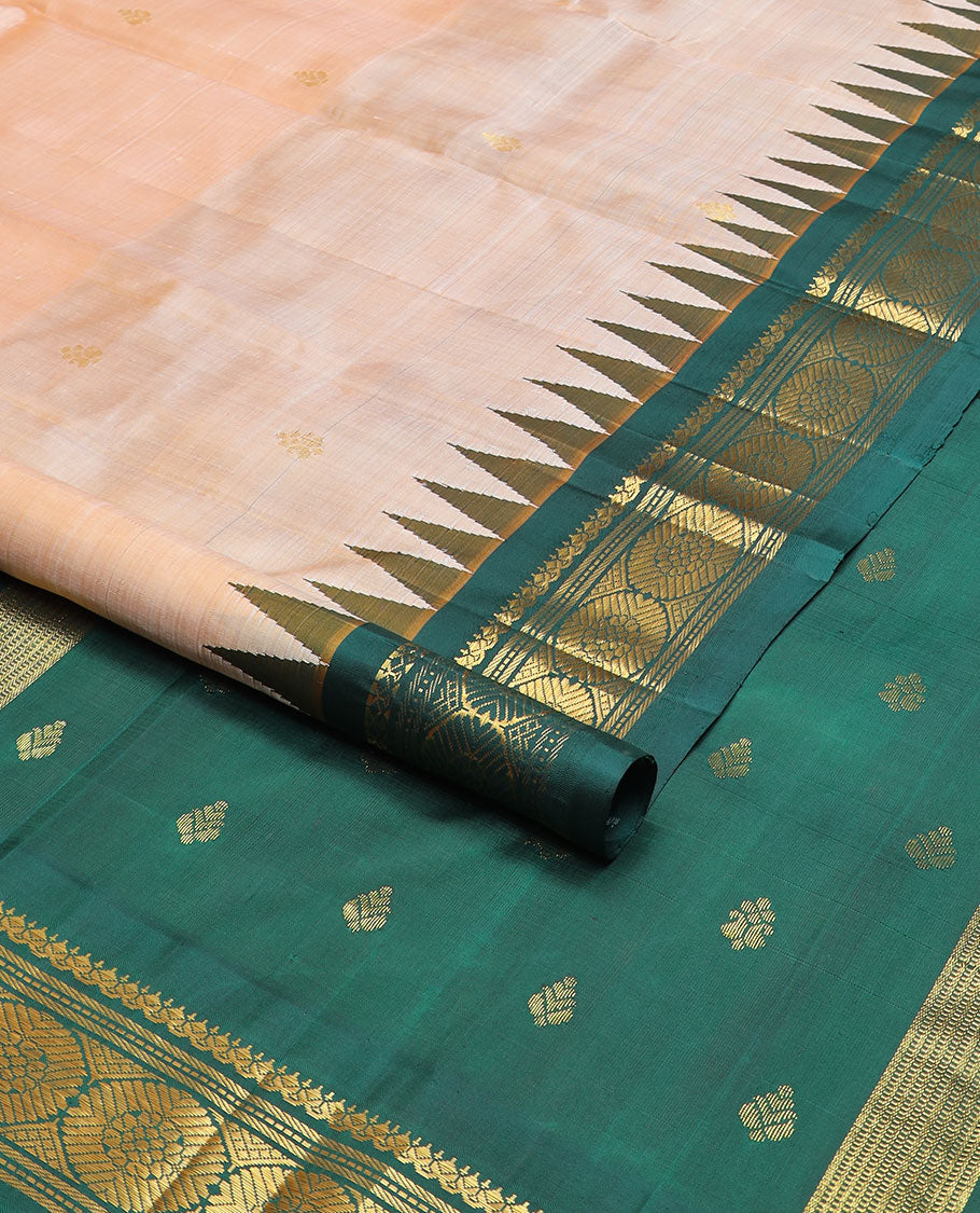 Sandal zari buttas kanchipuram silksaree,contrast one-sided thazampoo rekku border of salngai,muthu,banaras & chakram & zari design pallu