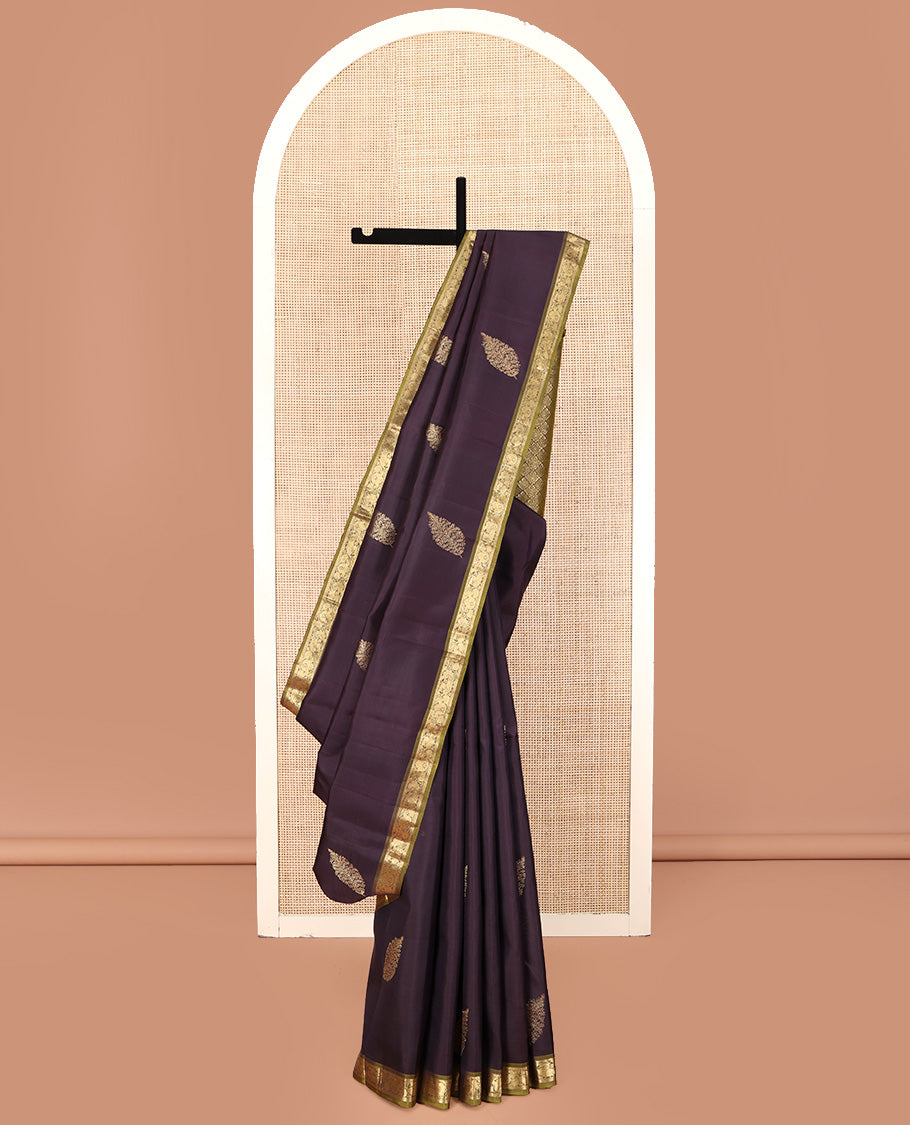 Brown Kanchipuram Silk Saree, Decked Up with Zari Buttas All Over Its Body, Complemented by Contrast Border of Manga and Mayil Designs, Grand Pallu, and Paired with a Contrast Blouse