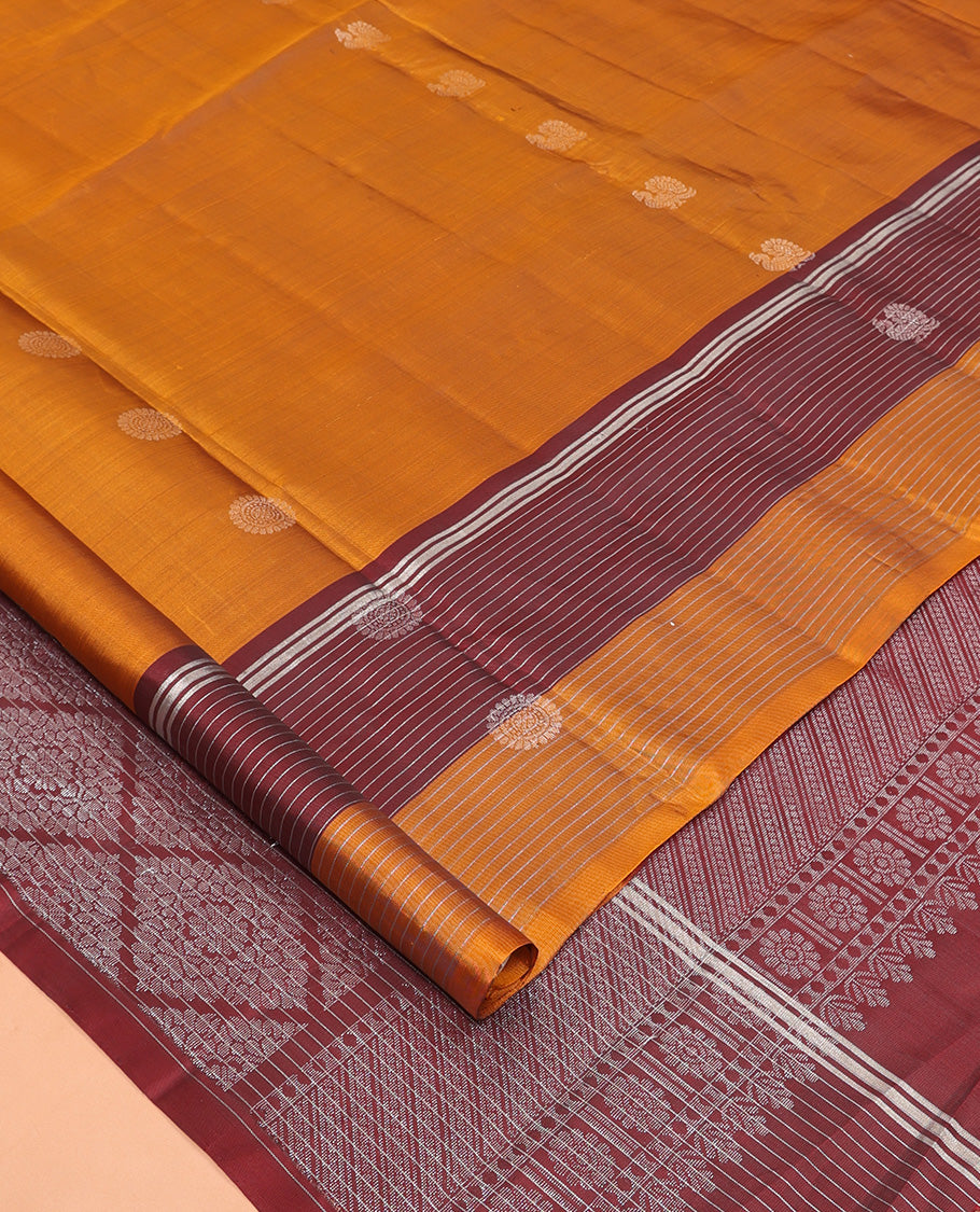 Orange Mayuri Lite Silk Mix Saree, Graced with Mayil and Chakram Zari Buttas, Complemented By Contrast Striped Border of Mayil Design, an Intricate Pallu, and a Contrast Blouse
