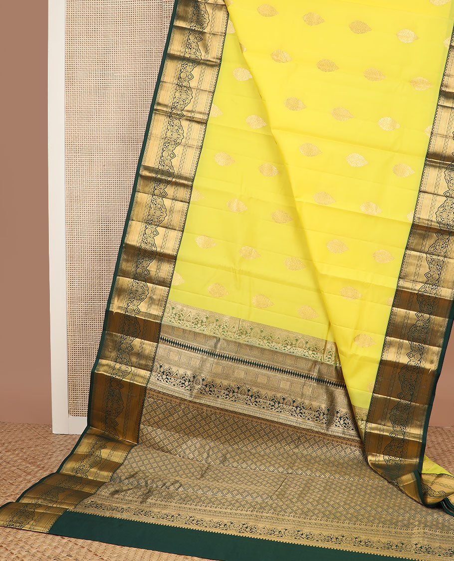 Yellow zari buttas vasundhara silkmix saree, contrast intricate pallu & border of thilakam,rudraksham,diamond & floral design