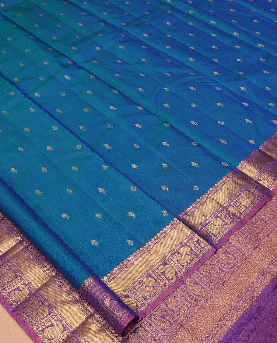 Blue Vasundhara Silk Saree, Woven with Zari Buttas, a Contrast Border of Manga and Mayil Designs, Grand Pallu, and a Contrast Blouse