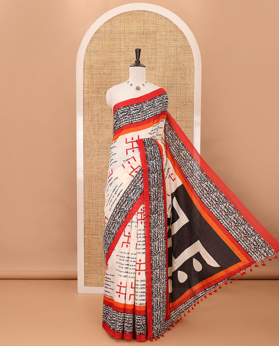 Chikku color swastika & Hindi typography printed jute cotton saree, contrast printed border, printed pallu & plain red blouse