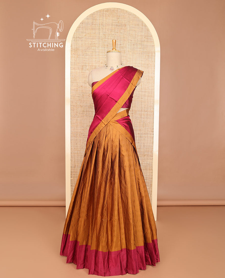 Brown striped half saree with contrast border, plain blouse & plain, checked border dhavani