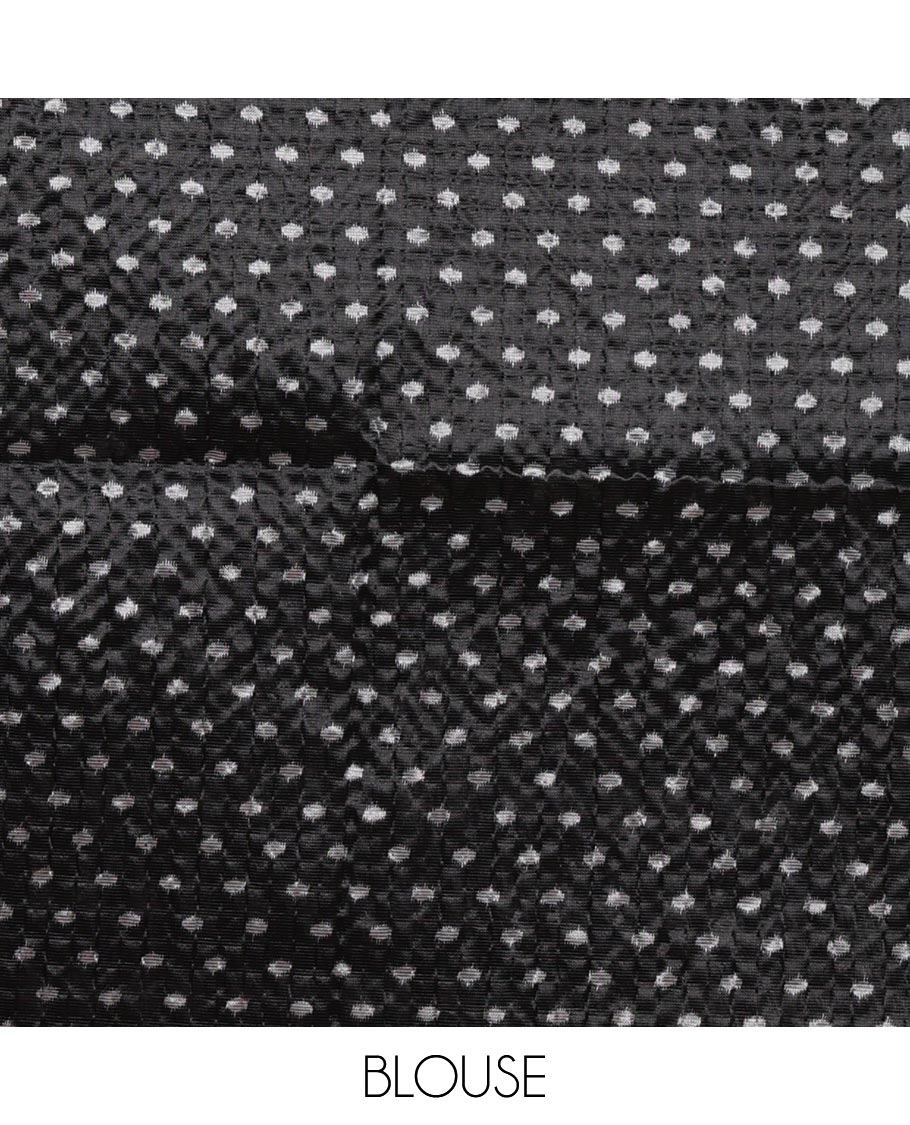 White ikat-style printed Litchi crushed saree, contrast black ikat border, pallu of ikat chevron & dots & ikat printed blouse