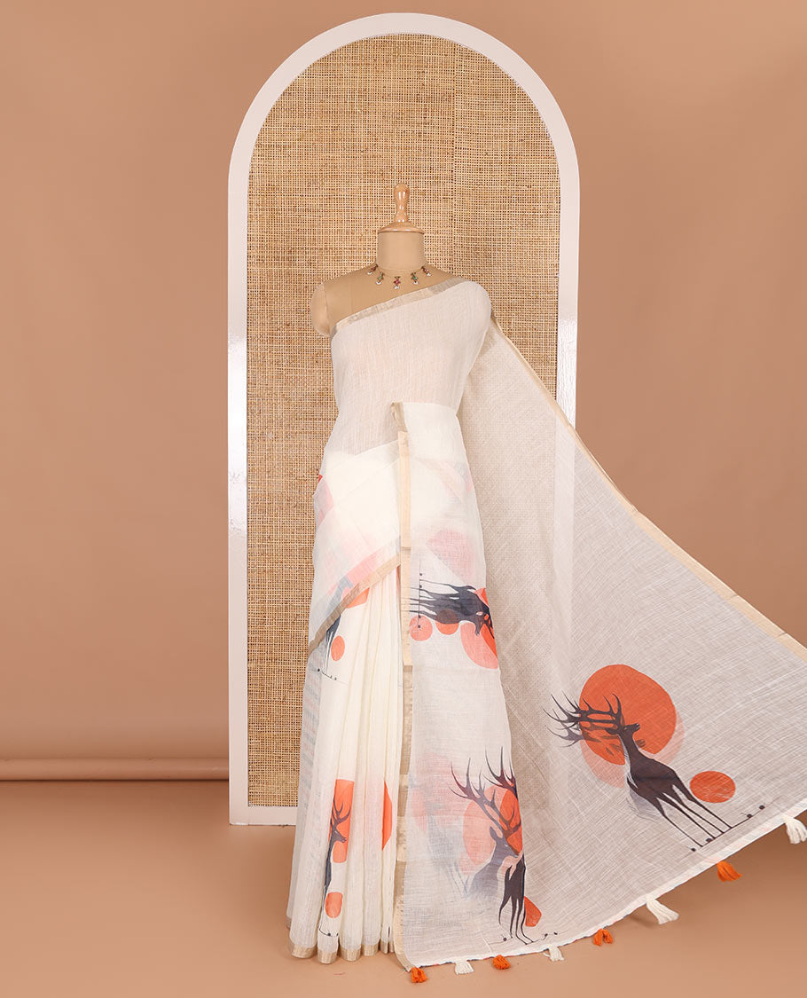 Cream sun and deer silhouette printed linen cotton saree, gold zari piping border, printed pallu, and a matching stripes printed blouse