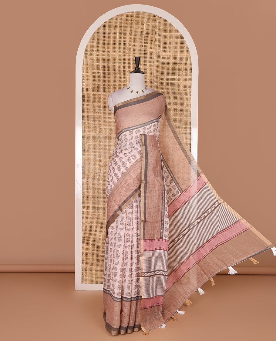 Peach cute elephant motifs printed linen cotton saree, contrast chevron border, pallu of stripes and chevron, and contrast printed blouse