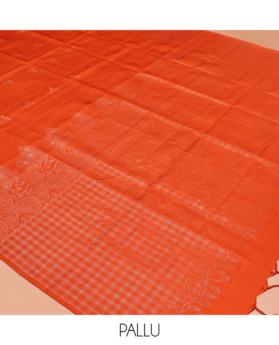 Borderless Orange Mayuri Soft Silk Saree, Sparsely Threaded with Leaf Buttas and Floral Buttas All Over Its Body, Zari Checked Pallu, and Paired with a Matching Blouse