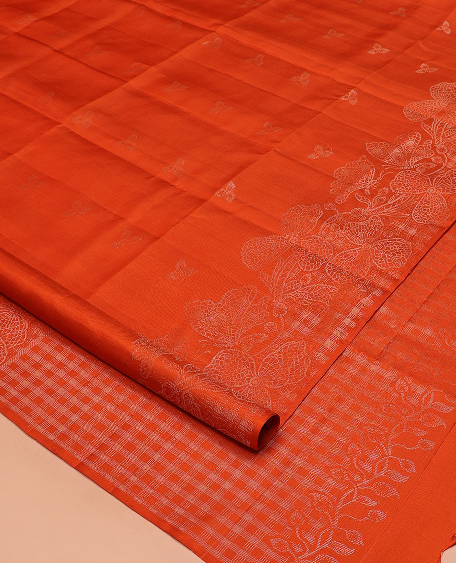 Borderless Orange Mayuri Soft Silk Saree, Sparsely Threaded with Leaf Buttas and Floral Buttas All Over Its Body, Zari Checked Pallu, and Paired with a Matching Blouse