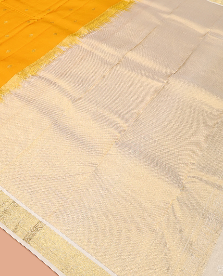 Yellow zari buttas Vasundhara silk mix saree, contrast border of rudraksham and mayil designs, and zari-rich pallu