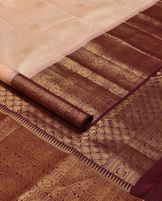 Sandal zari buttas silk saree, contrast border of ara bogudi, jadai nagam, and dhavana kodi, and spade motifs steeped pallu