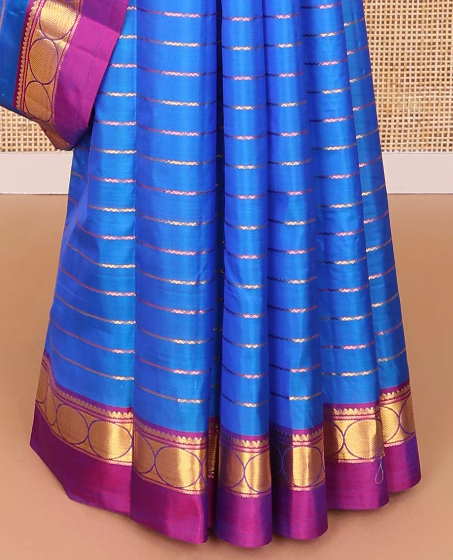 Blue striped kancheepuram silk saree with contrast intricate zari design border & striped pallu