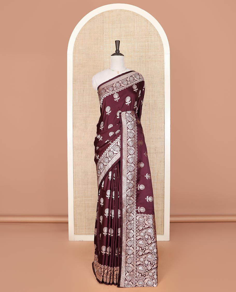 Maroon zari buttas mushru silk saree, floral creeper design border, and intricately designed pallu