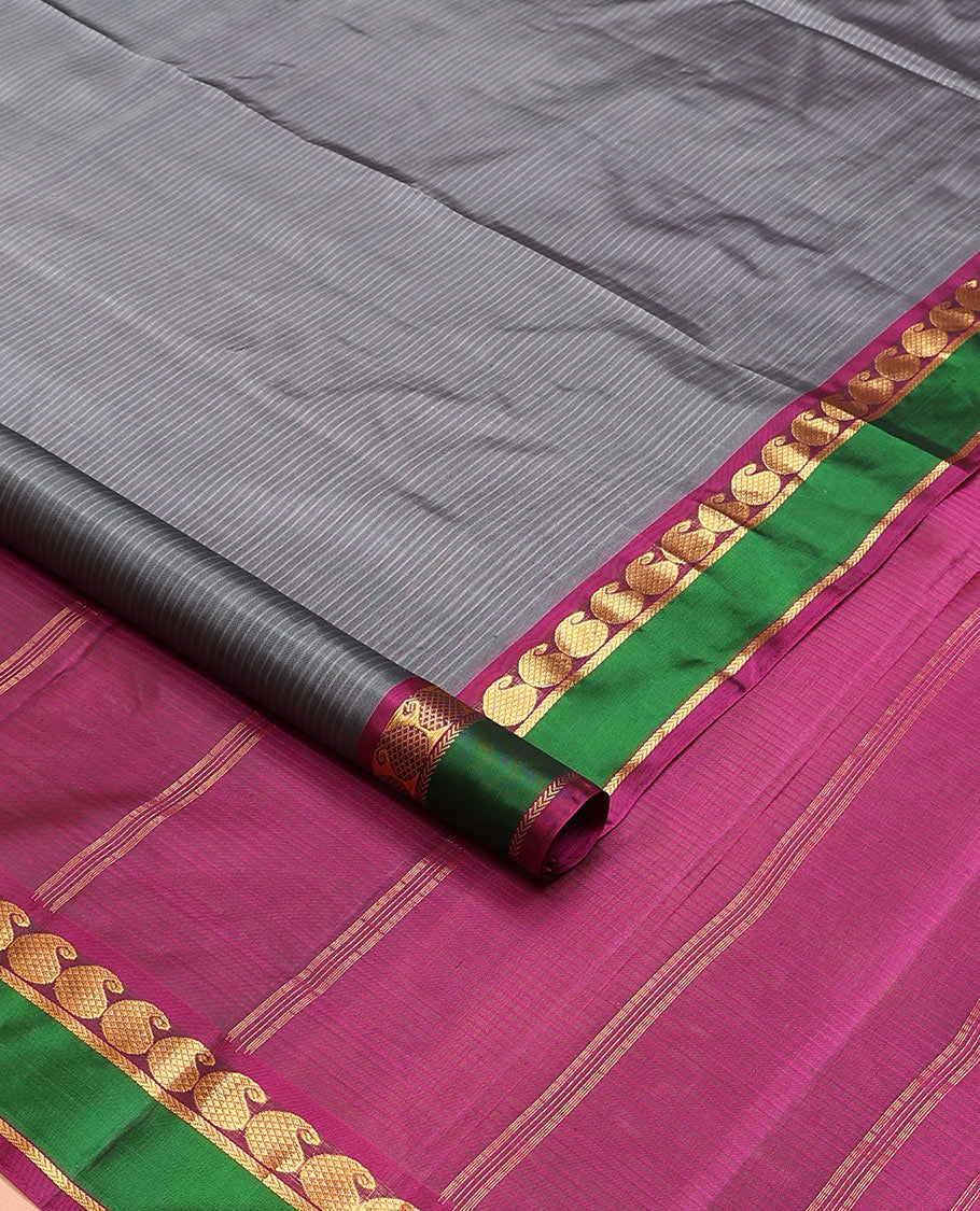 Grey striped nine-yard silk saree, contrast rettai pettu border of mayil manga, and kathir designs, and zari striped pallu