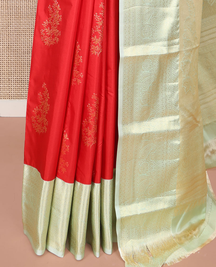 Red Budget Silk Saree, Charmingly Accented with Zari Buttas All Over Its Body, Complemented by a Contrast Traditional Zari Design Border of Paisleys, Majestically Zari Detailed Pallu, and Paired with a Contrast Blouse