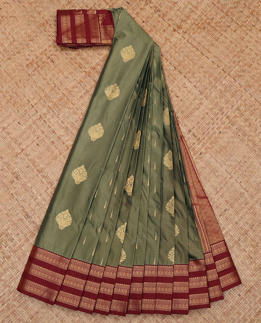 Green Budget Silk Saree, Detailed with Zari Buttas, a Contrast Traditional Zari Border, Jaal Pallu, and a Contrast Blouse