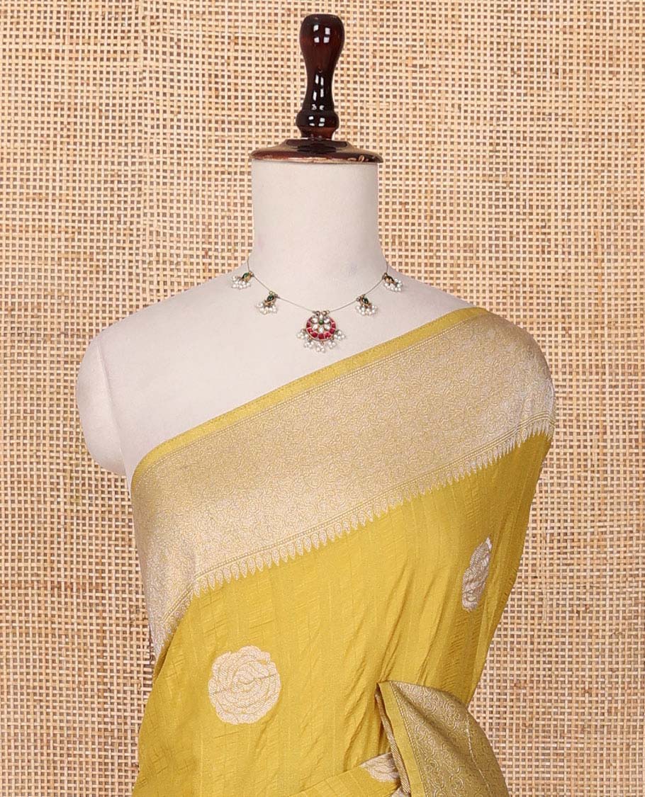 Yellow rose buttas woven fancy crepe saree, traditional zari border & intricate pallu