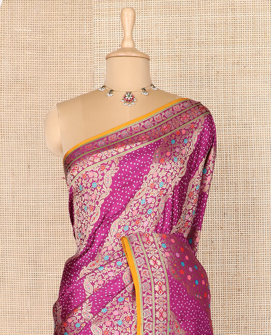 Purple bandhani dottes and meenakari floral-paisley design dola silk saree, self-border, and pallu of meenakari floral-paisley designs