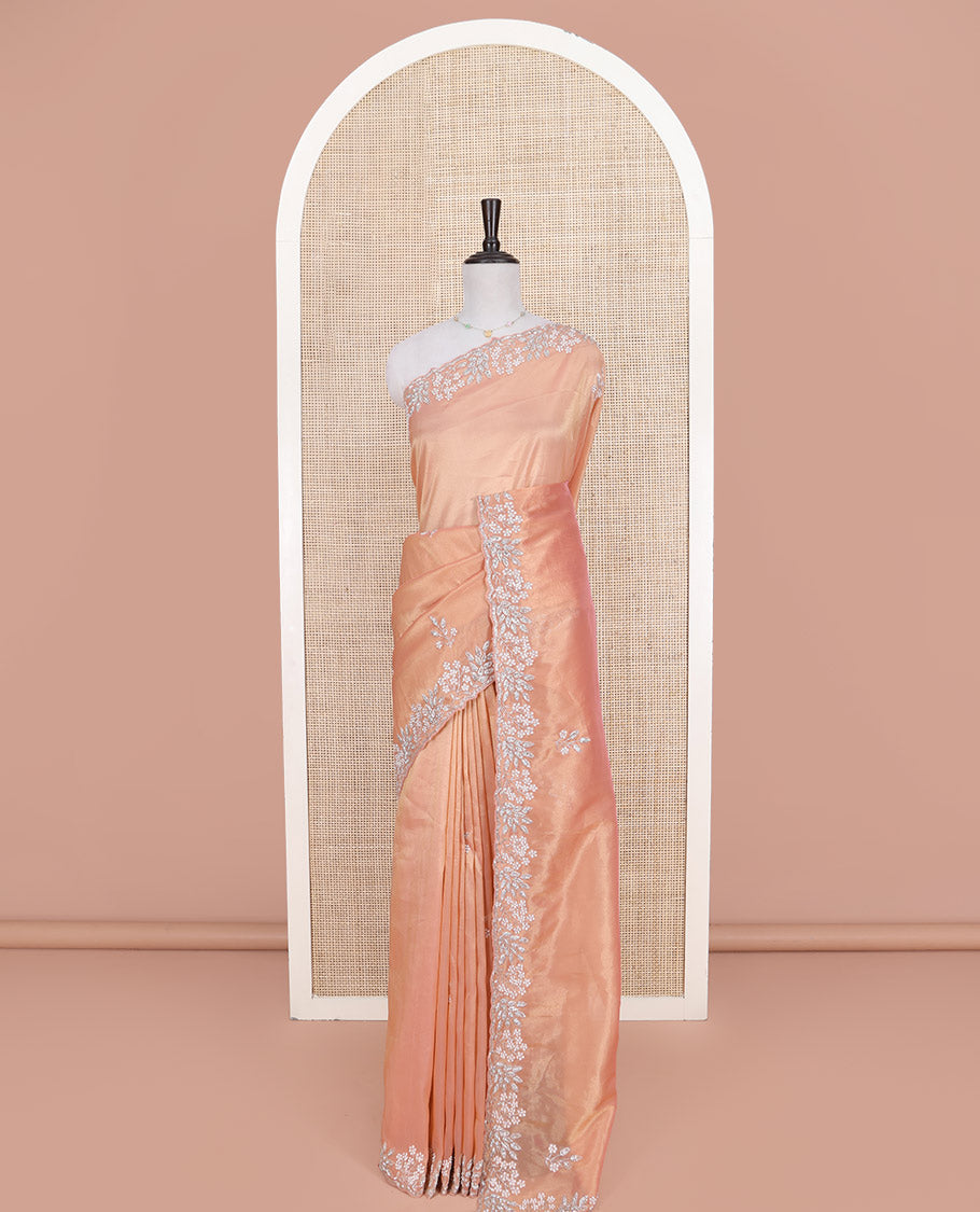 Peach Designer Saree, Beautifully Bedecked with Stone-Embroidered Buttas on Its Body, Highlighted by a Scallop Floral-Themed Embroidered Border, Self-Pallu, and Paired with a Matching Blouse