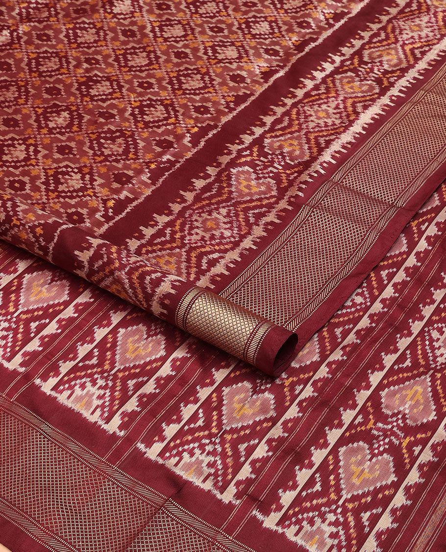 Maroon ikkat saree with ikkat jaal design, traditional design zari border & pallu of ikkat design