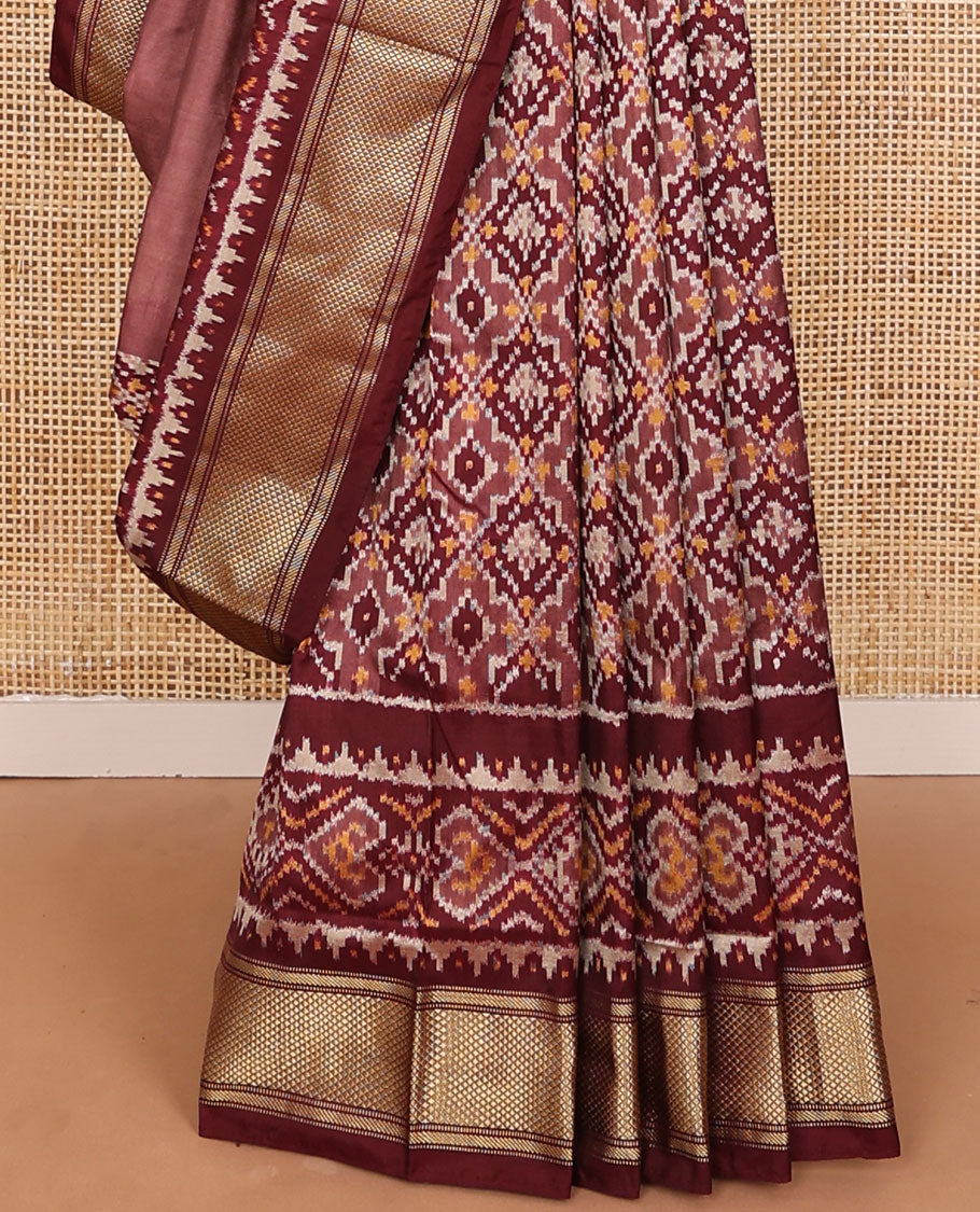 Maroon ikkat saree with ikkat jaal design, traditional design zari border & pallu of ikkat design