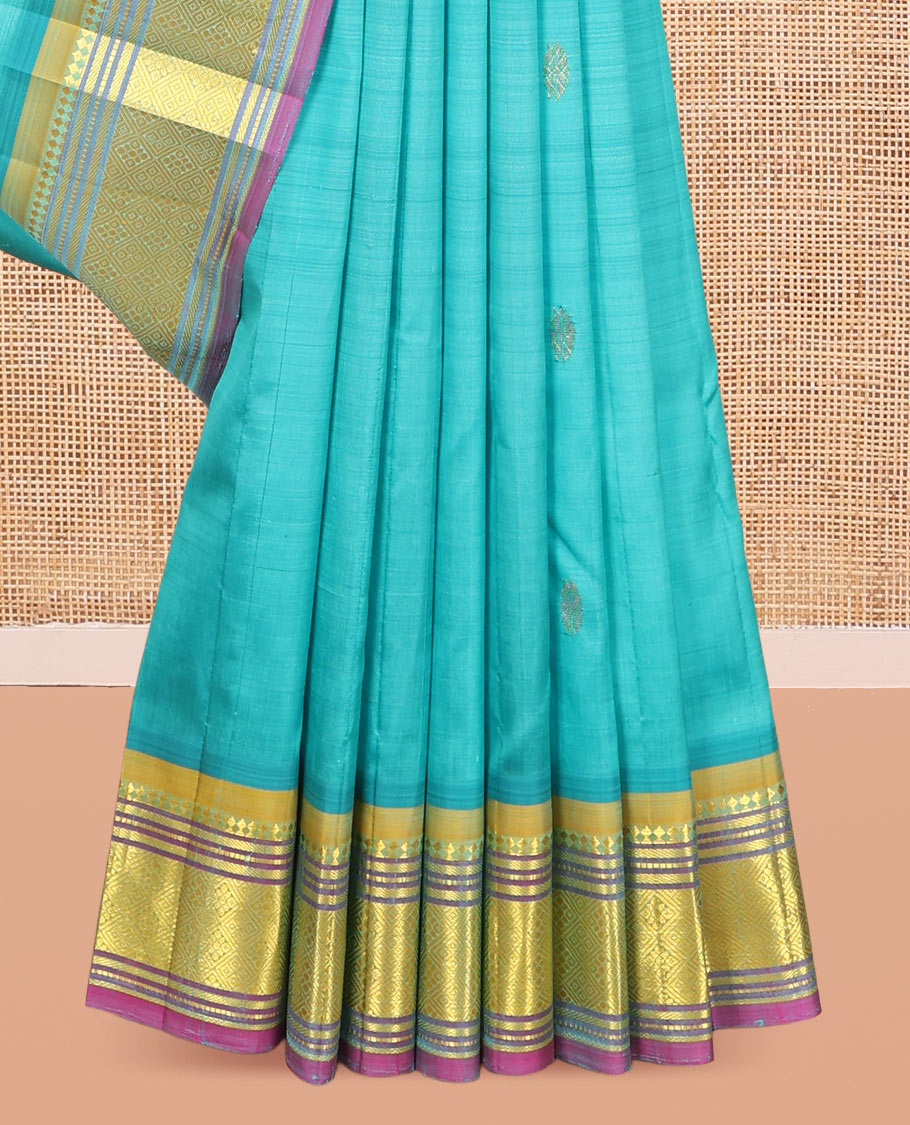 Blue Kanchipuram Silk Saree, Woven with Zari Buttas, a Contrast One-Sided Border of Panner Sombu, Banaras, Muthu, and Jaal Designs, Kodi Visiry Pallu, and a No Blouse