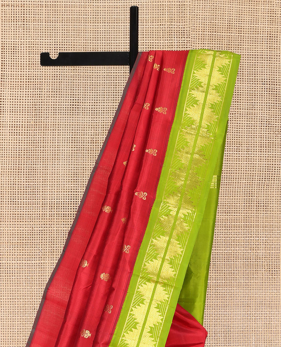 Red Kanchipuram Silk Saree, Detailed with Zari Buttas on Its Body, Complemented by a Contrast One-Sided Korvai Border of Thazampoo Rekku Designs, Pallu Depicts Zari Designs, and Comes Without a Blouse