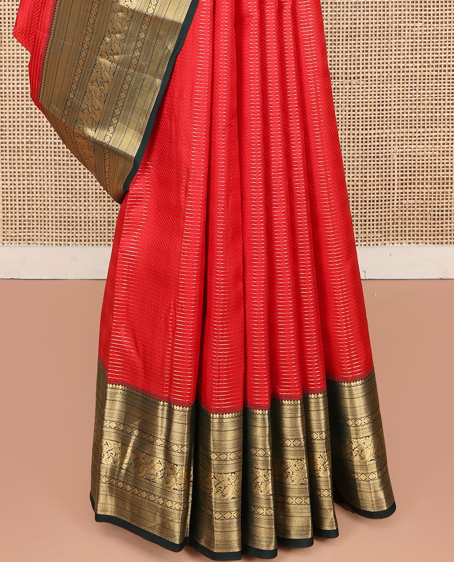 Red Kanchipuram Silk Saree, Woven with Geometric Patterns All Over Its Body, Complemented by Contrast Border of Thilakam Mokku, Kathir, Vanki, Banaras, Laddu Kamalam, and Mayil Designs, a Meticulously Crafted Pallu, and Paired with a Contrast Blouse
