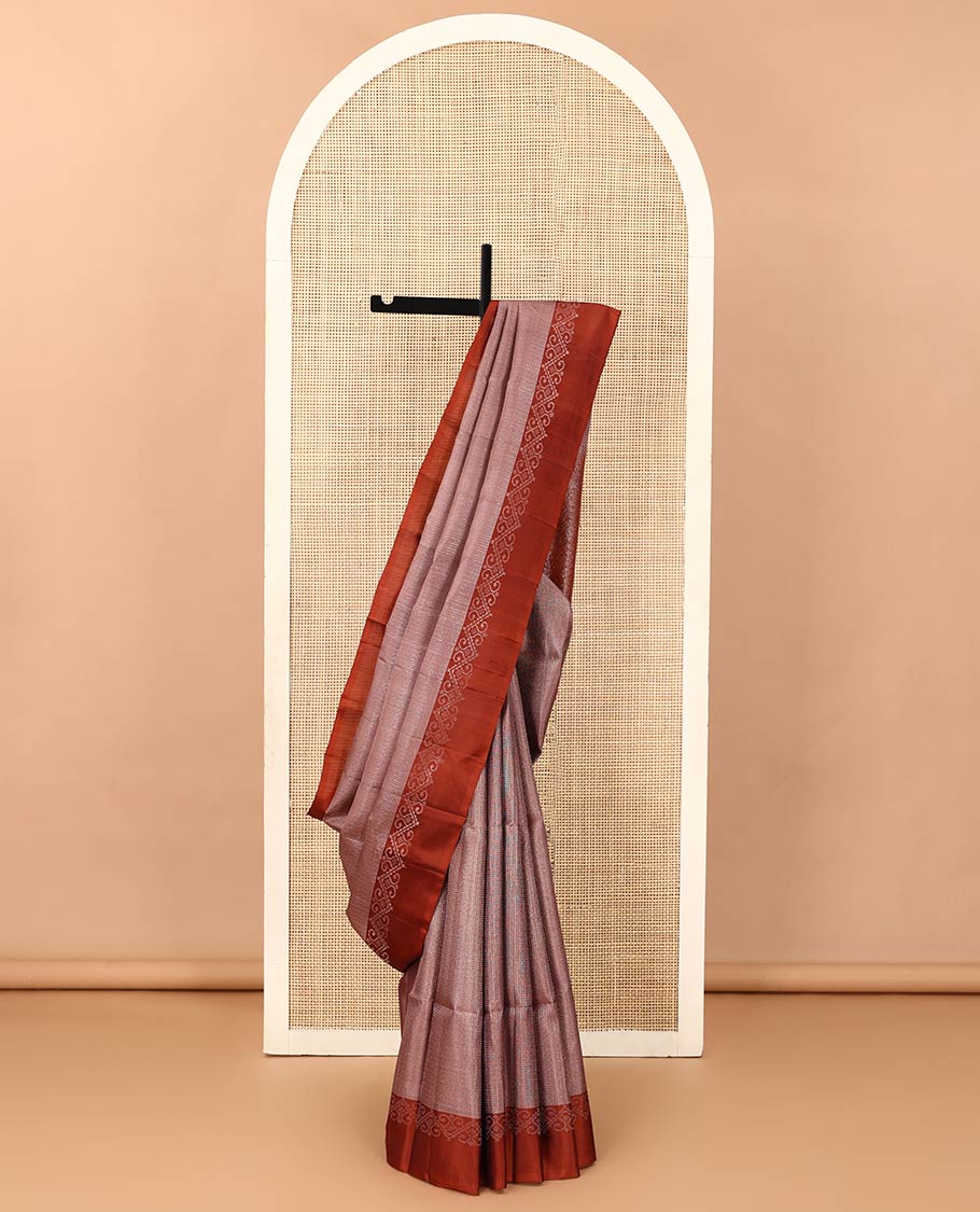 Brown geometric patterned soft silk saree, contrast unique design border, and pallu of jaal design