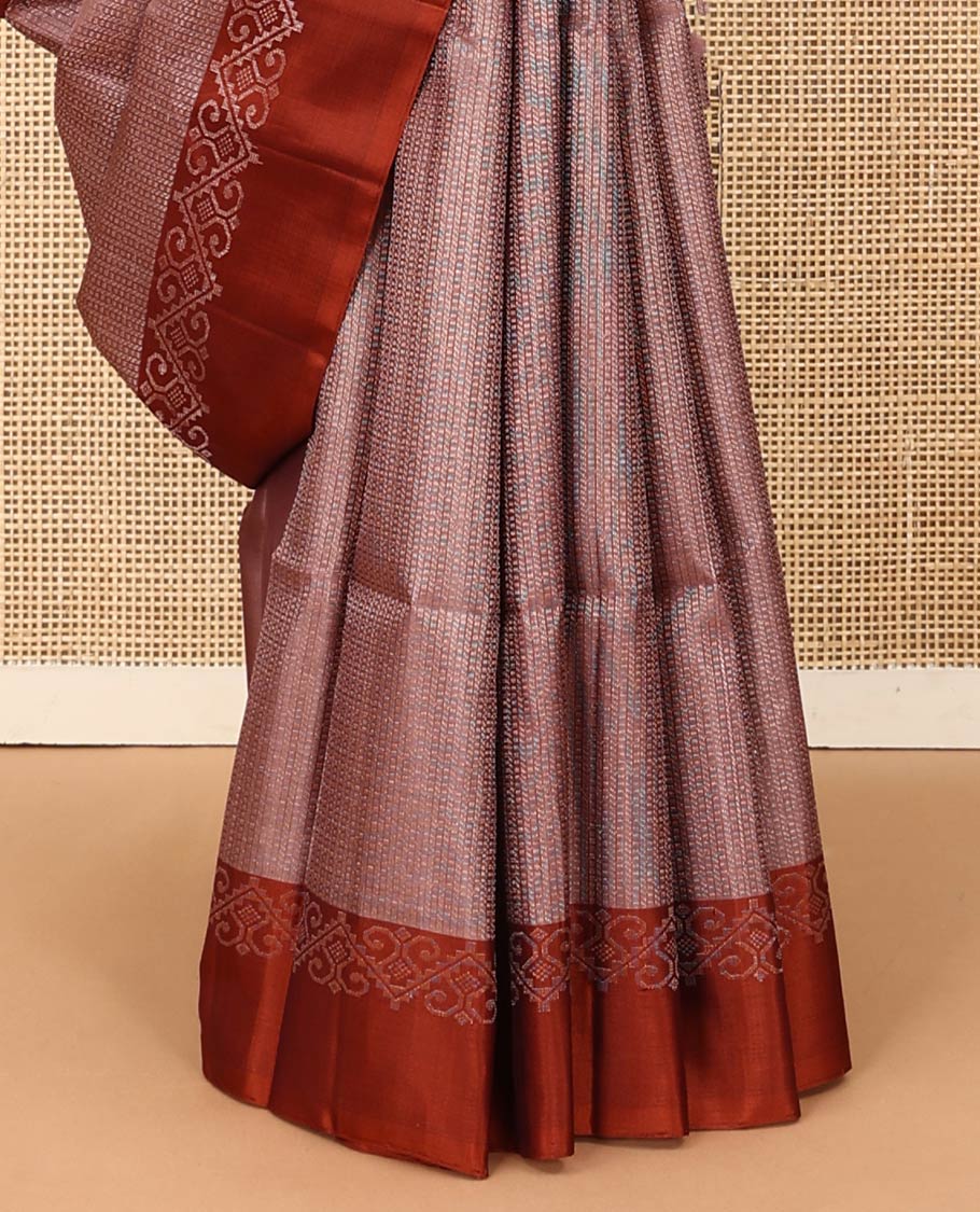 Brown geometric patterned soft silk saree, contrast unique design border, and pallu of jaal design