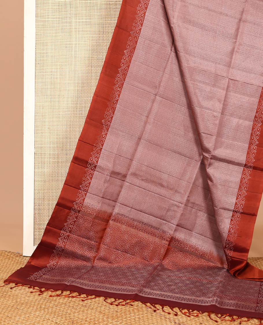 Brown geometric patterned soft silk saree, contrast unique design border, and pallu of jaal design