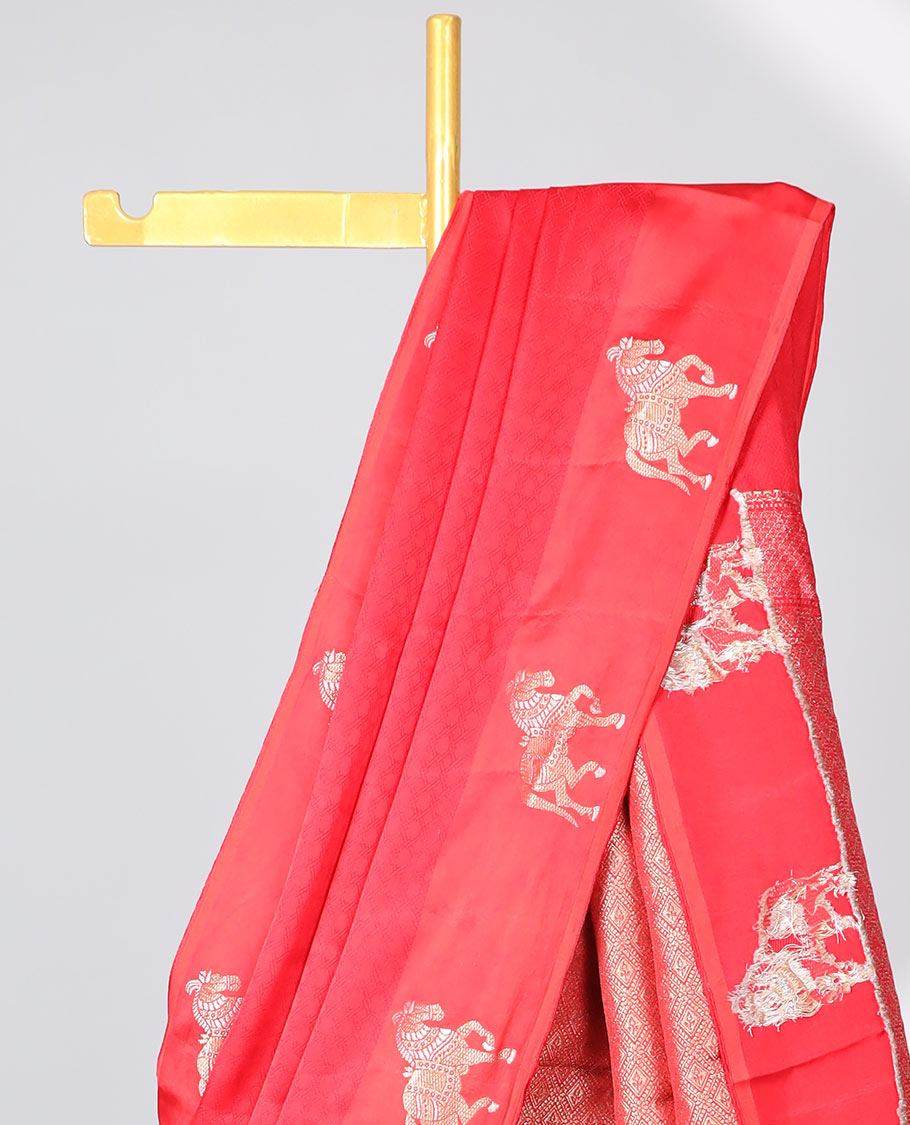 Red striped mushru silk saree with animal motifs border & intricate jaal design pallu