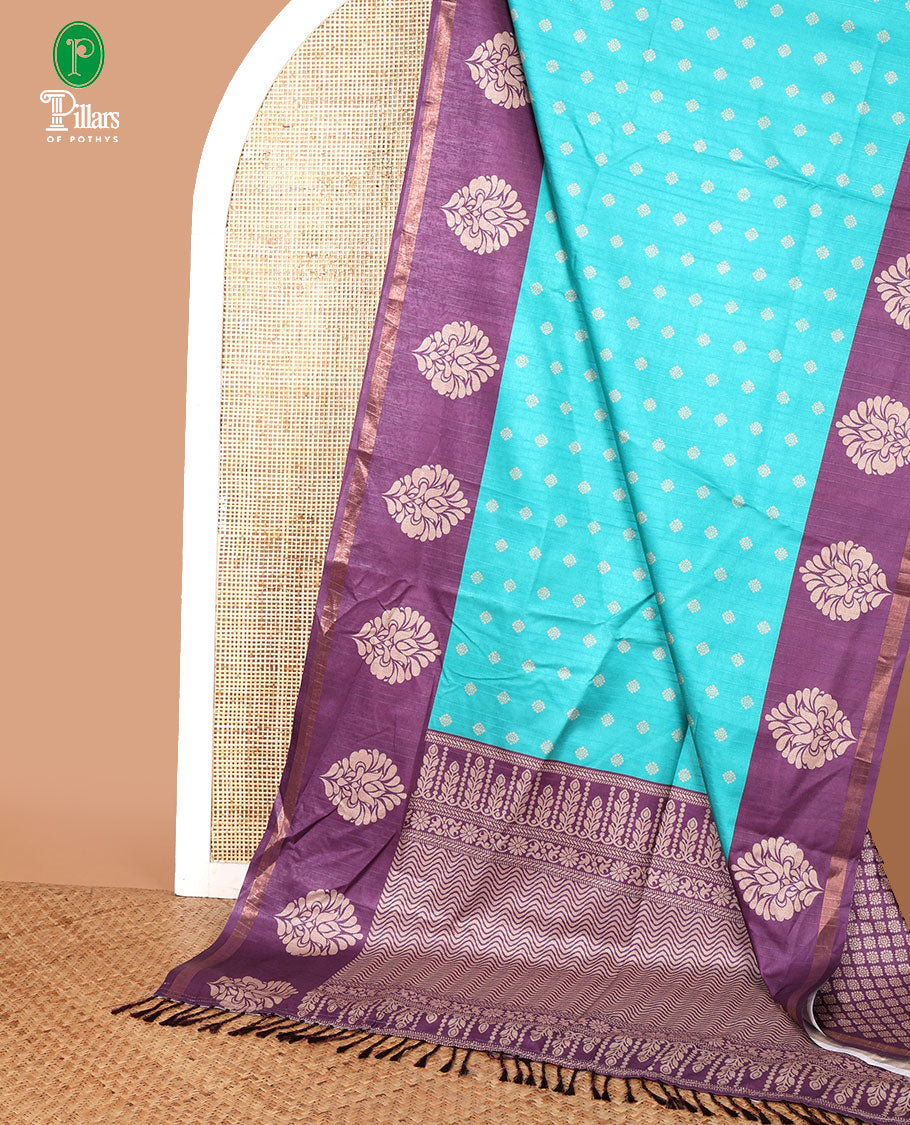 Rama green with purple butta printed kathan silk saree with contrast floral zari border & rich printed pallu along with printed blouse