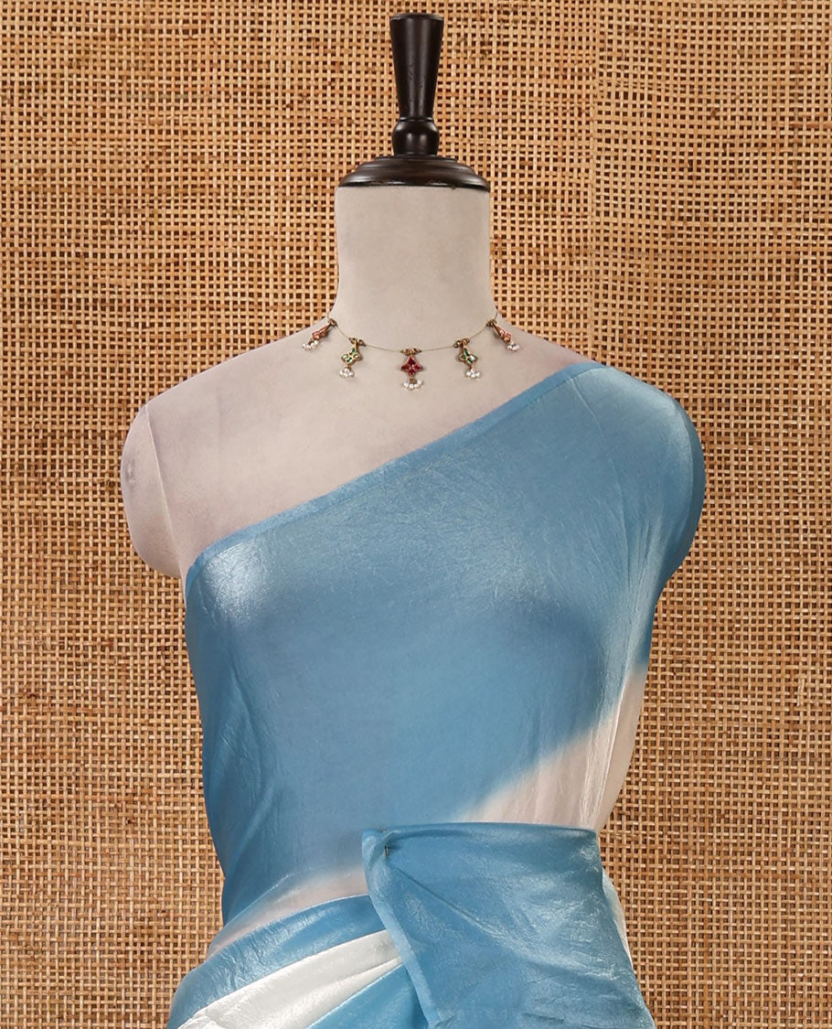 Borderless blue tie-dye-style printed fendy satin saree, self-pallu with tassels & plain blouse