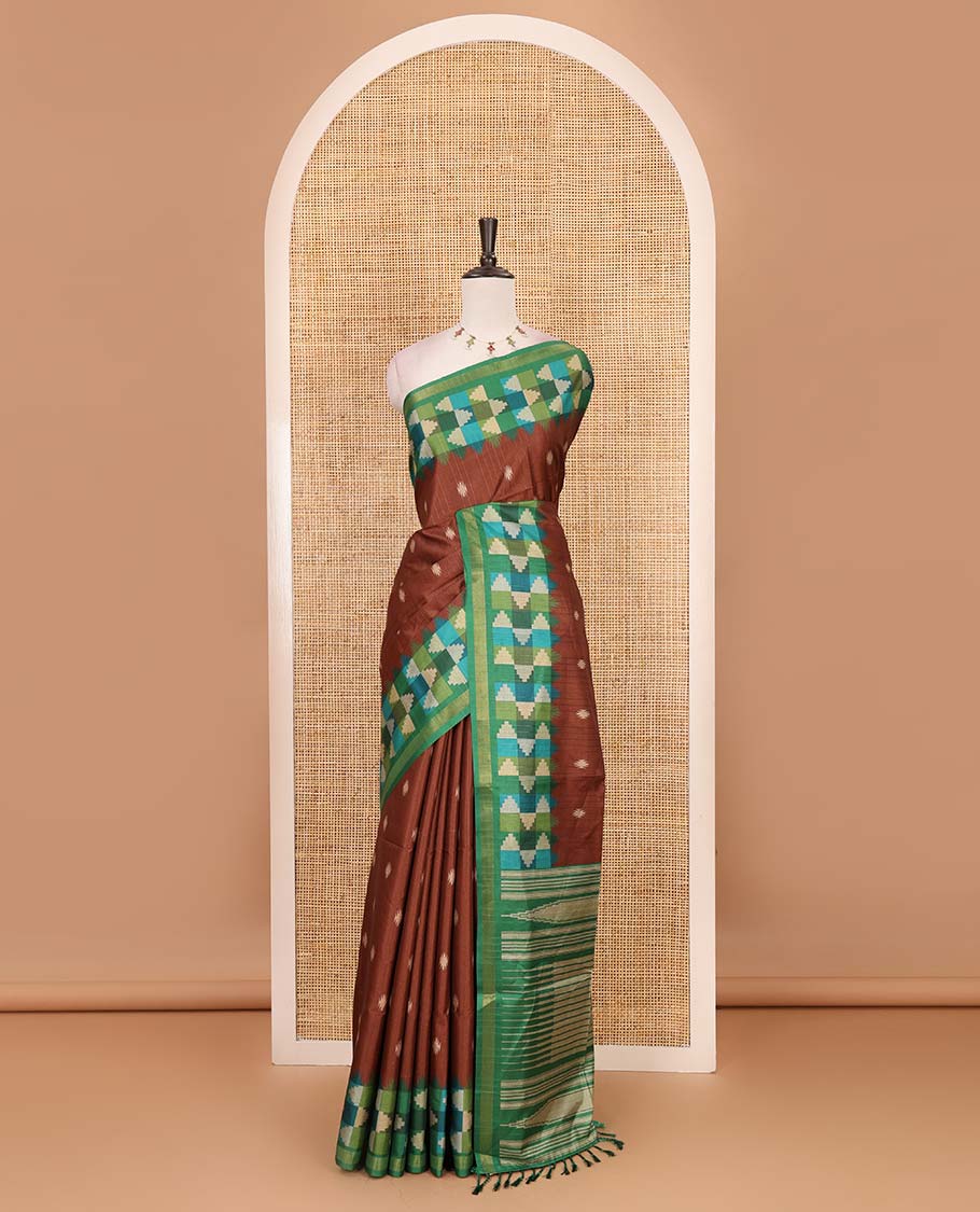Brown striped and buttas kathan silk saree, contrast multi-color temple border, seer printed pallu, and contrast printed blouse