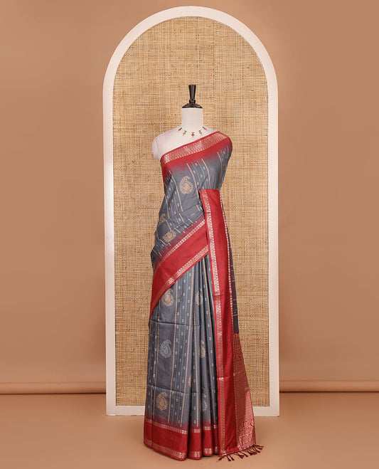 Steel grey floral, manga and striped katan silk saree, contrast rettai pettu temple border of diamond and Greek key design, jaal pallu, and contrast printed blouse