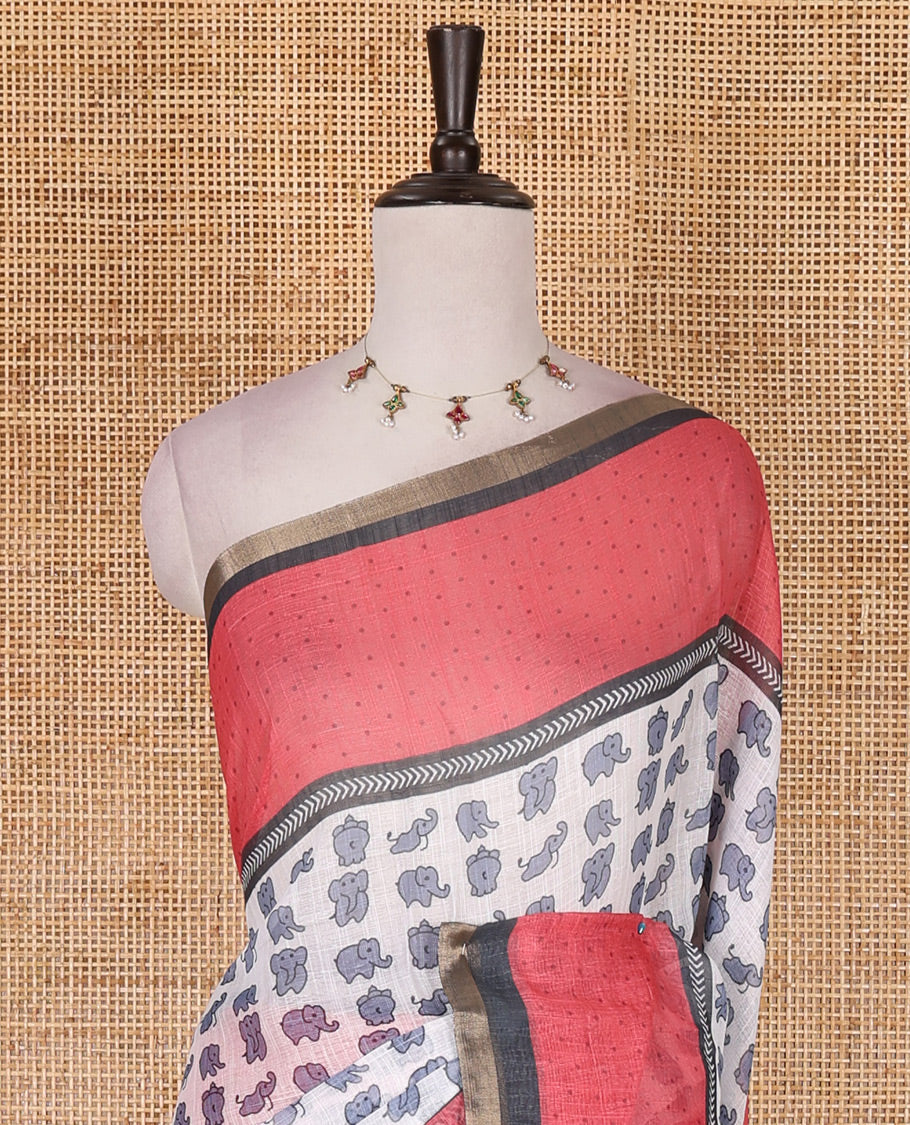 White cute elephant motifs printed linen cotton saree, contrast chevron border, pallu of stripes and chevron, and contrast printed blouse