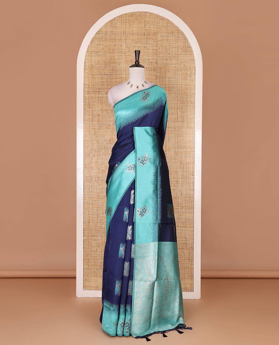Navy blue-turquoise floral buttas elite soft silk saree, contrast floral buttas border, and pallu of Mughal-style intricate zari designs
