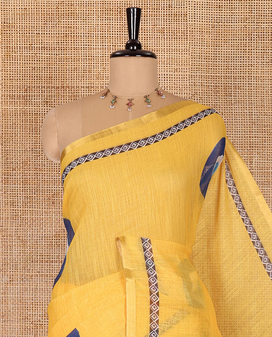 Yellow evil eye motifs printed linen cotton saree, diamond motifs printed with piping border, chevron printed pallu, and a matching blouse