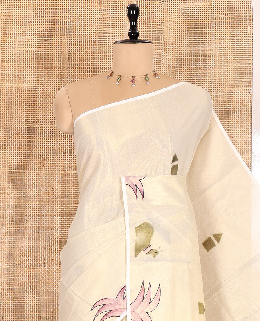 Gold-Green Kerala Cotton Saree Subtly Sparked with Handblock-Printed Flora-Fauna-Architecture Motifs, Featuring a Self Pallu with Matching Flora-Fauna-Architecture Handblock Prints, Paired with a Matching Plain Blouse.