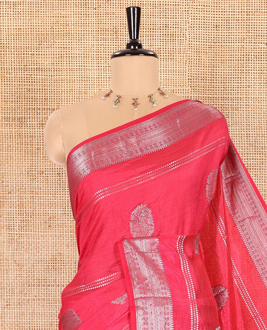 Rani Pink Semi-Tussar Saree Elevated with Gold Zari Stripes and Elegant Paisley Zari Buttas, Featuring a Subtly Shimmering Pallu Adorned with Traditional Zari Designs, and Paired with a Matching Blouse