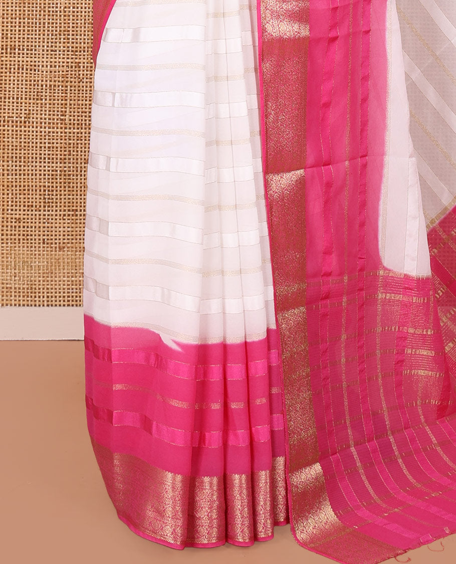 White and Rani Georgette Saree, Subtly Sparkled with Horizontal Zari Stripes All Over Its Body, Complemented by a Contrast Traditional Zari Design Border, Gleaming Zari Striped Pallu, and Paired with a Contrast Blouse
