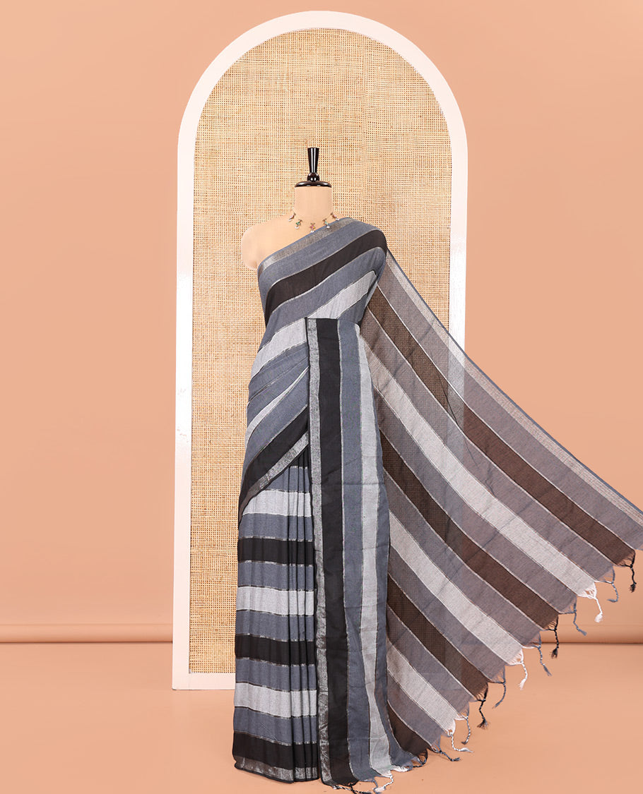 Grey Khadi Mul Cotton Saree, Beautified with Vertical Stripes All Over Its Body, Subtle Piping Border, a Self-Pallu, and Paired with a Matching Blouse