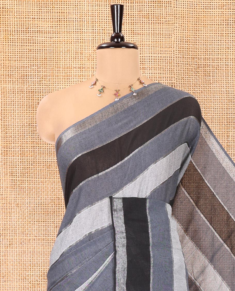 Grey Khadi Mul Cotton Saree, Beautified with Vertical Stripes All Over Its Body, Subtle Piping Border, a Self-Pallu, and Paired with a Matching Blouse