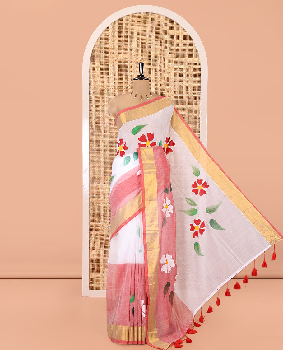 White and Peach Khadi Mul Cotton Saree, Adorned with Hand-Brush Painting-Style Floral Block Printed Body, a Subtle Gold Zari Border, a Self-Pallu, and Paired with a Matching Blouse