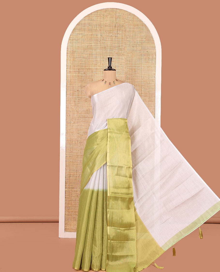 Borderless Lime Green Plain Tissue Saree, a Self-Pallu with Tassels, and a Matching Blouse